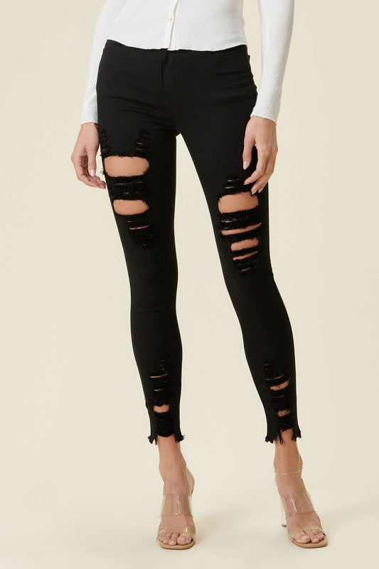Black Color High Rise Distressed Skinny Jeans with a Raw Hem