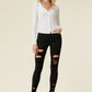 High Rise Distressed Skinny Jeans with a Raw Hem